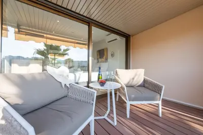 a room with a couch and chairs and a table at Beautiful 2-Br Apartment Sea View Beaches Within Walking Distance in Cannes