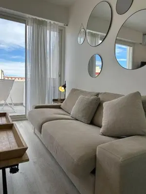 a bathroom with a toilet and a glass shower at Adresse privilège pour les congres in Cannes