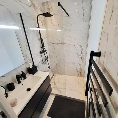 a bathroom with a sink and a shower at Exceptional 3-room apartment in quiet Cannes in Cannes