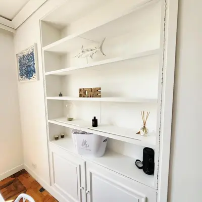 a white built in shelf in a room at Exceptional 3-room apartment in quiet Cannes in Cannes