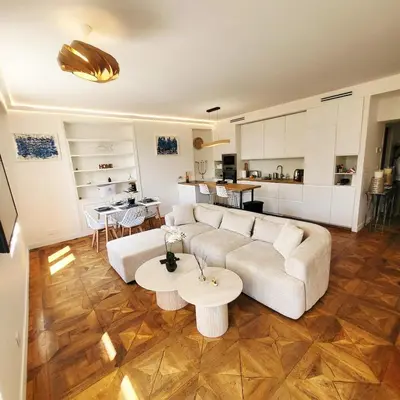 a living room with a couch and a table at Exceptional 3-room apartment in quiet Cannes in Cannes