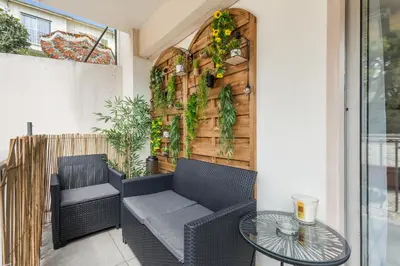 a patio with two chairs and a table at Studio in Cannes city center with terrace in Cannes