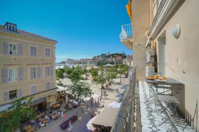 a view of a street from a balcony of a building at Spacieux 2 chambres BALCON, FELIX FAURE-COEUR DE CANNES A2B023 in Cannes