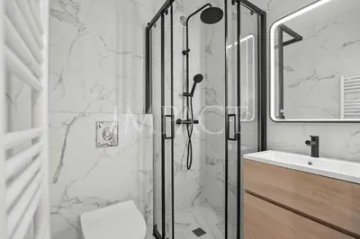 a bathroom with a shower with a toilet and a sink at REF 2014 - Cannes center - Apartment to rent in Cannes