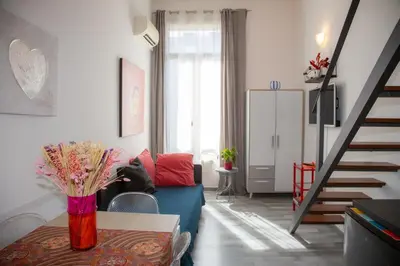 a living room with a couch and a table at Sweet Holiday by Connexion in Cannes