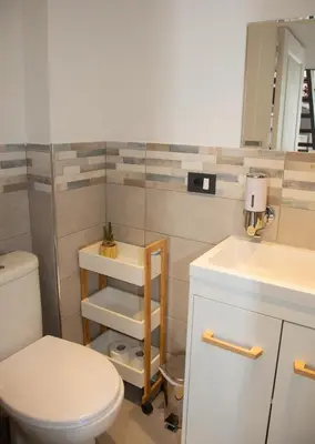 a bathroom with a toilet and a sink at Sweet Holiday by Connexion in Cannes