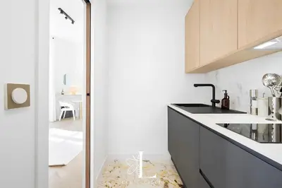 a kitchen with a sink and a counter top at Les Lucioles 3 - Luxury Studio Apartment in Cannes