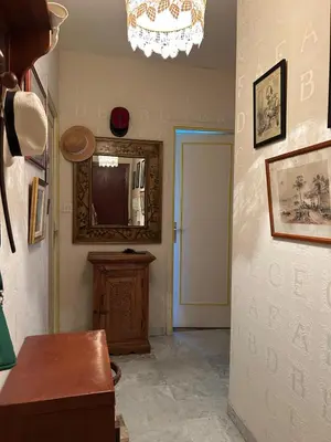 a room with a hallway with a mirror and a door at Cozy Cannes Studio - 12 Min Walk To The Beach - Free Parking in Cannes