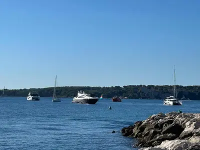 a group of boats in a large body of water at Cozy Cannes Studio - 12 Min Walk To The Beach - Free Parking in Cannes