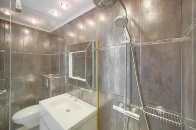 a bathroom with a shower and a sink and a toilet at Studio Cannes Centre 2 min from La Croisette in Cannes