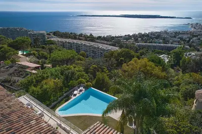 an aerial view of a house with a swimming pool at REF 2138 - Cannes - Villa sea view in Cannes