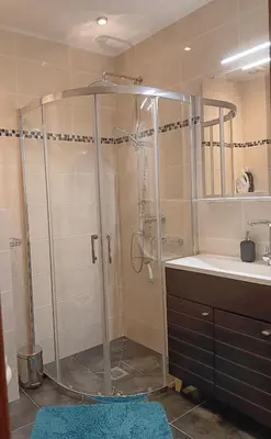 a bathroom with a shower and a sink at L'Atlantide in Cannes