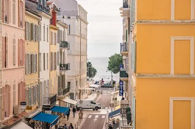 a view of a street in a city with buildings at Truly amazing 3 bedrooms Cannes center!! in Cannes