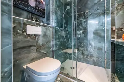 a bathroom with a toilet and a shower at Beautiful studio rue d'Antibes in Cannes