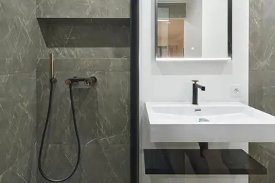 a bathroom with a sink and a shower at Wdf 2 bedroom heart of Cannes in Cannes