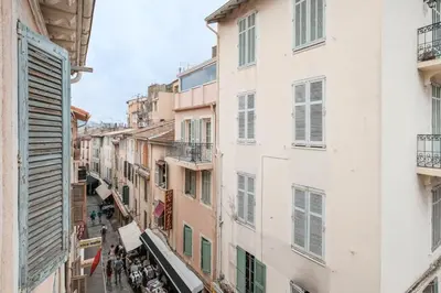an alley in a city with buildings at Cozystay 1087 - Charming studio historic Suquet in Cannes