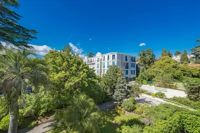 an aerial view of a building with trees at Beautiful studio with balcony in Cannes in Cannes