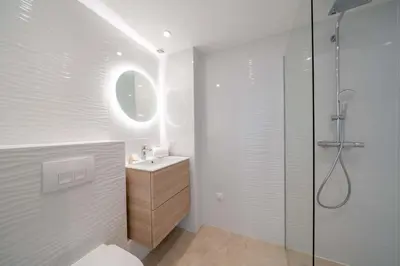 a bathroom with a toilet and a sink and a shower at Beautiful studio with balcony in Cannes in Cannes