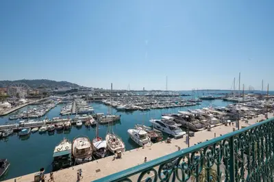 a marina with a bunch of boats in the water at Cozystay 1243 Port & Sea View Cannes in Cannes