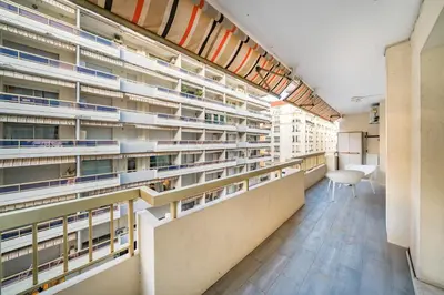 an empty library with a chair in the middle of it at Apartment for 4 people in the heart of Cannes in Cannes