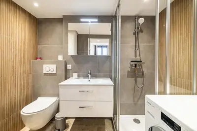 a bathroom with a toilet and a sink and a shower at 84 MEY - Apartment for 4 people near Croisette and Palais in Cannes