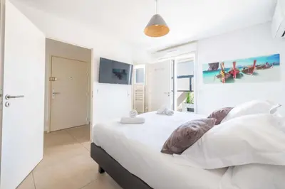 a bathroom with a shower and a sink at 3-Br Rooftop with Jacuzzi & Parking Cannes in Cannes