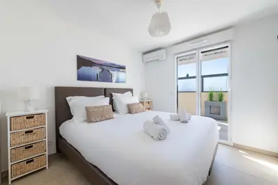 a bathroom with a sink and a tub and a shower at 3-Br Rooftop with Jacuzzi & Parking Cannes in Cannes