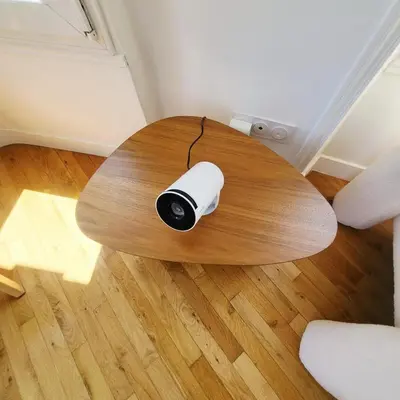 a surfboard sitting on top of a wooden table at Appartement 3 pièces en plein coeur de Cannes in Cannes