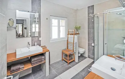 a bathroom with a sink and a shower at 2 Bedroom Awesome Apartment In Cannes in Cannes