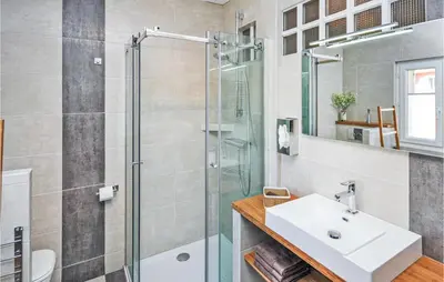 a bathroom with a sink and a shower at 2 Bedroom Awesome Apartment In Cannes in Cannes