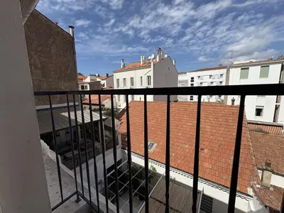 a balcony with a view of some buildings at 285G Studio 5mn Palais in Cannes