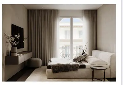 a bedroom with a bed and a window at Croisette 066 in Cannes