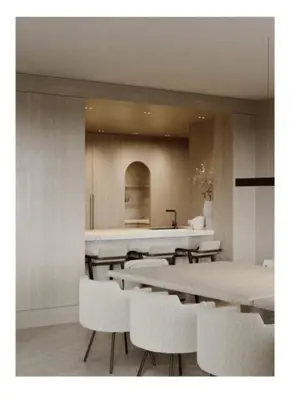 a dining room with white tables and white chairs at Croisette 066 in Cannes