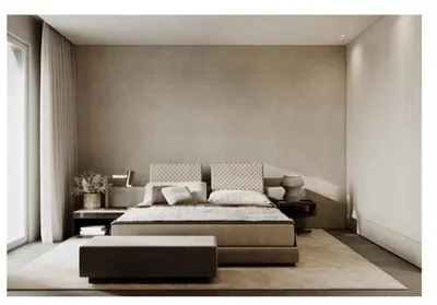 a bedroom with a large bed and a couch at Croisette 066 in Cannes