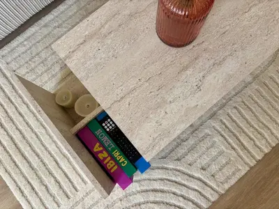 a group of books sitting on a floor at Appartement cosy - 4 personnes - Centre Cannes in Cannes