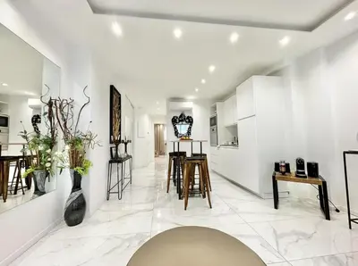 a living room with white walls and white floors at Cannes one bedroom apartment - 20LM1 in Cannes