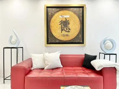 a red couch in a living room with a painting at Cannes one bedroom apartment - 20LM1 in Cannes