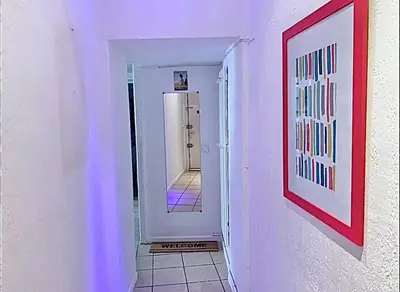 a hallway with a door leading to a bathroom at Cannes 1 bedroom apartment - 12RP1 in Cannes