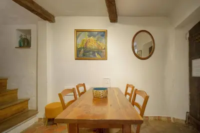 a dining room table with chairs and a mirror at MIPIM Fisherman House Rooftop Terrace Walk to Palais Suquet in Cannes