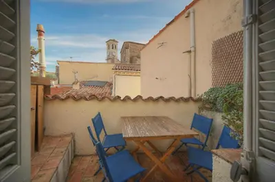 a bedroom with a large bed with a window at MIPIM Fisherman House Rooftop Terrace Walk to Palais Suquet in Cannes