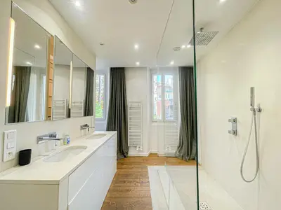 a bathroom with two sinks and a shower at Atelier Meynadier in Cannes