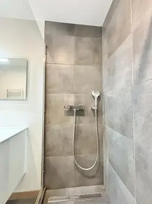 a shower with a shower head in a bathroom at Cannes 1 bedroom apartment - 57A2 in Cannes