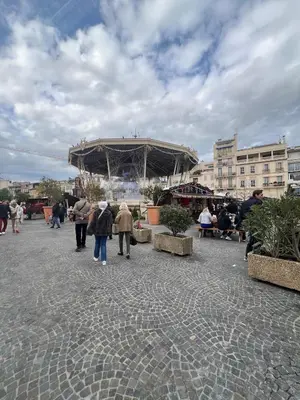 a group of people walking around in a plaza at King size studio Rue Félix Faure 100 m Palais et plage in Cannes