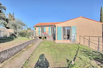 a house with a yard in front of it at Villa Grand Jas in Cannes