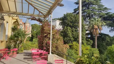 a view of a city with trees and buildings at Hôtel-résidence-Windsor in Cannes