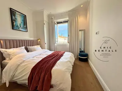 a bathroom with a shower and a toilet and a mirror at SCARLETT 4 Bedroom next to the Croisette in Cannes