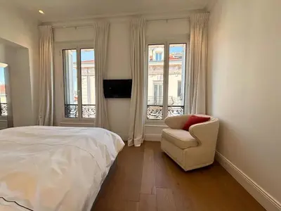 a bathroom with a sink and a washing machine at SCARLETT 4 Bedroom next to the Croisette in Cannes