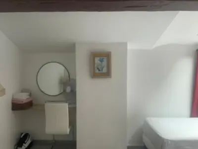 a kitchen with a sink and a stove at Cannes centre ville en face du port in Cannes