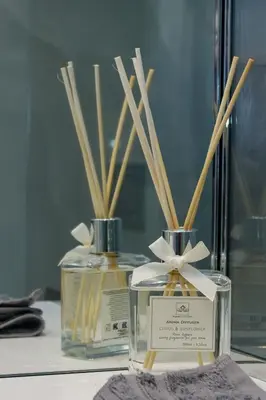 a couple of bottles of perfume on a table at Palais Riviera in Cannes