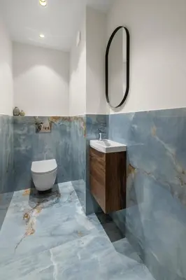 a bathroom with a toilet and a mirror at REF 2032 Renovated apartment-Sea view -Ideal for conferences and vacations in Cannes